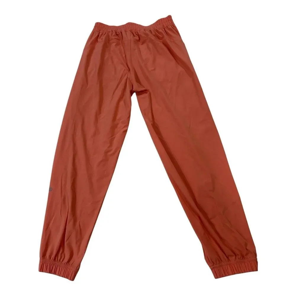 Lululemon Tear-Away Mid-Rise Track Pant Size 6 Coral Kiss Orange Swift LW5GAXS